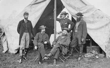 R. William Moore and Allan Pinkerton. Standing: George H. Bangs, John C. Babcock, and Augustus K. Littlefield, October 1862